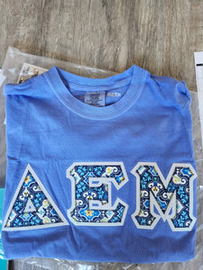 Delta Epsilon Mu Comfort Colors Letter Shirt - Periwinkle